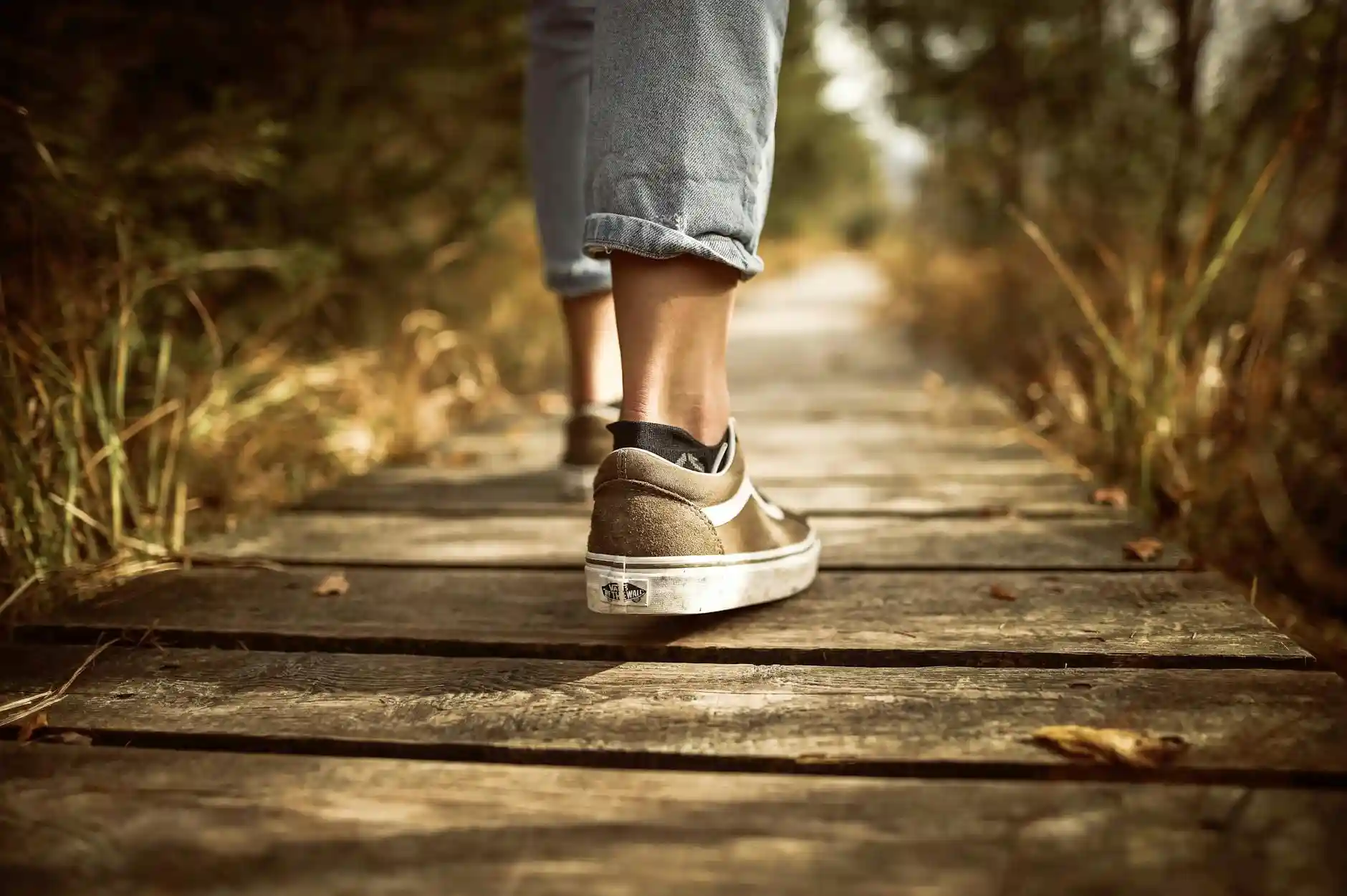 <a href="https://www.pexels.com/photo/person-stands-on-brown-pathway-631986/">Photo by Tobi on Pexels</a>